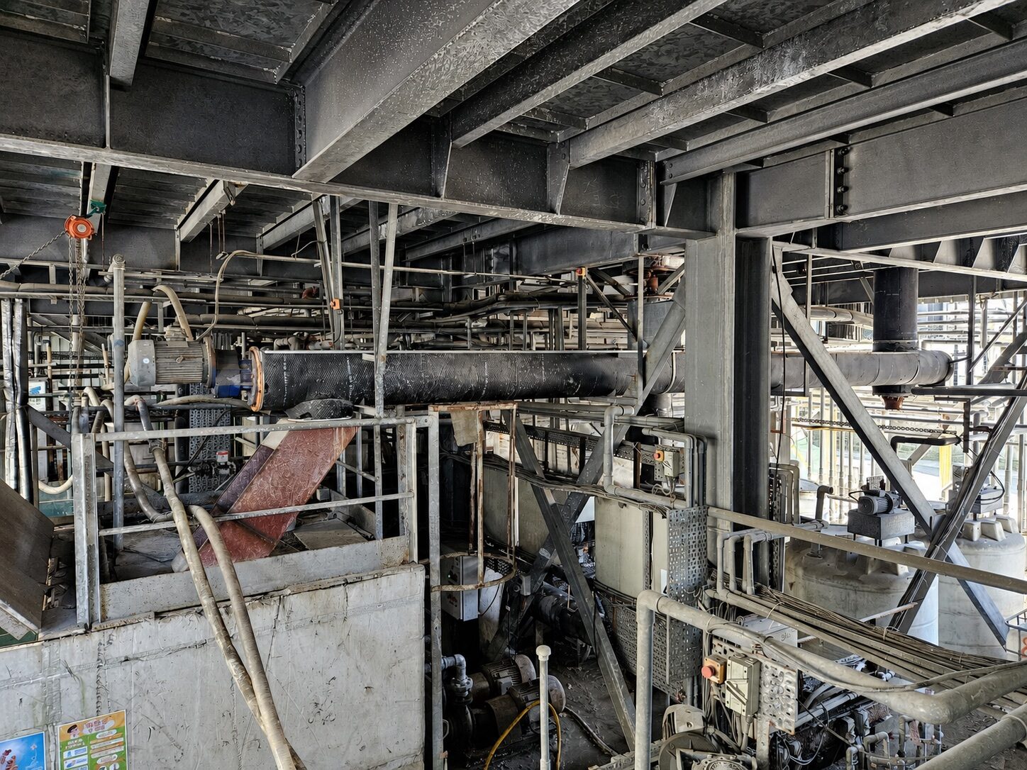 Ice-handling conveyor and structural service platforms inside the Sheung Shui tube-ice plant