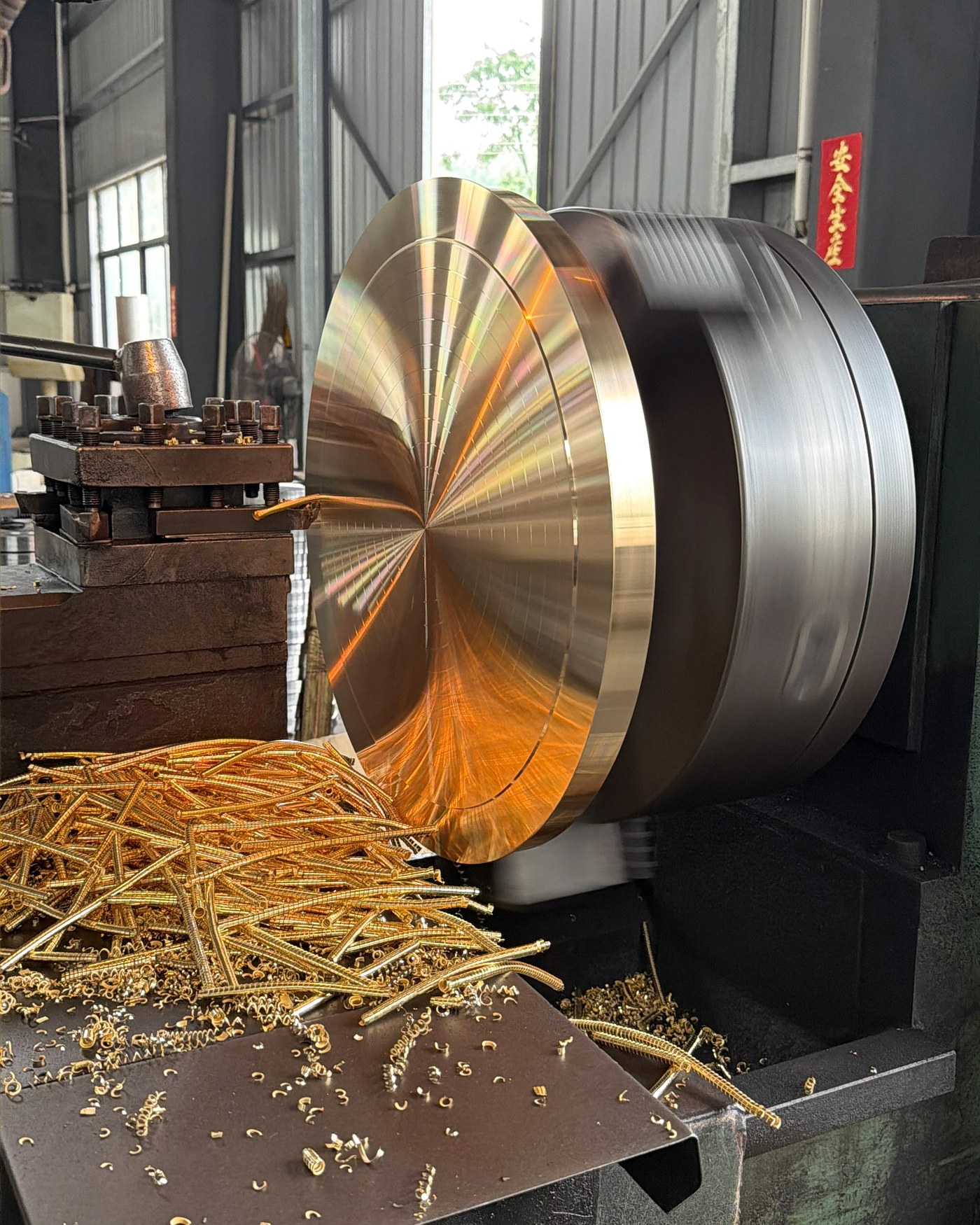 A large component undergoing a turning operation